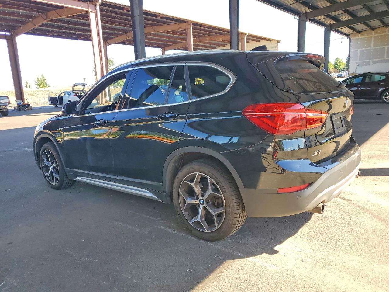 WBXHT3C56K3H34121 · 2019 BMW X1 · 2/12