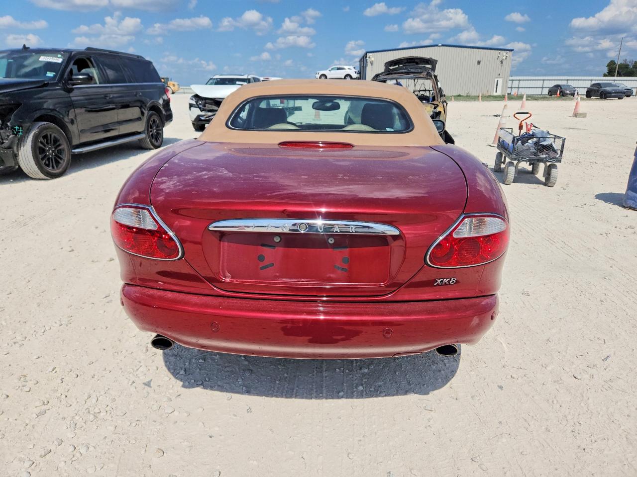 SAJDA42CX2NA24037 · 2002 JAGUAR XK8 · 6/12