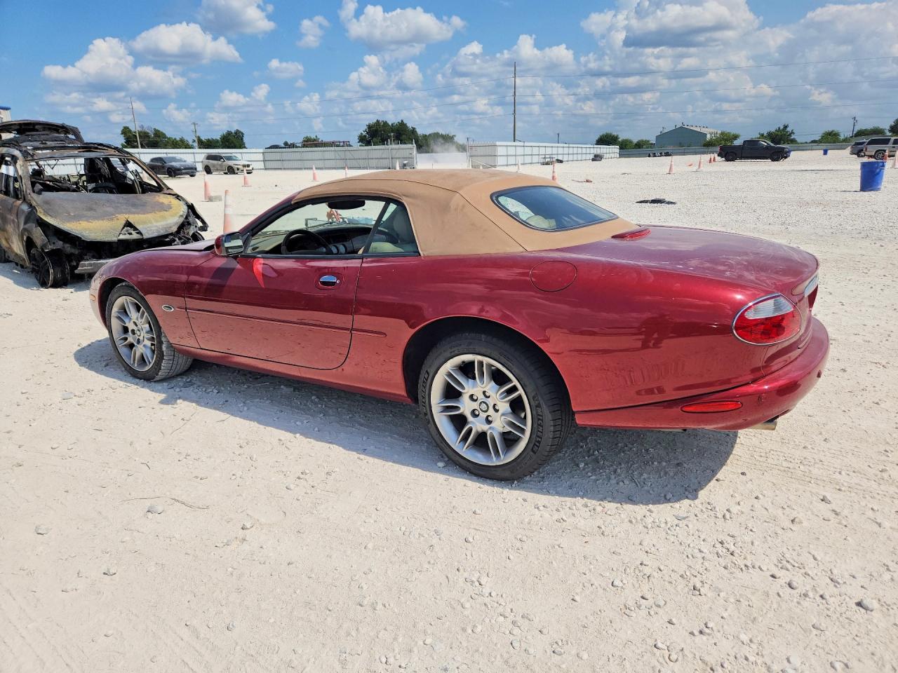 SAJDA42CX2NA24037 · 2002 JAGUAR XK8 · 2/12