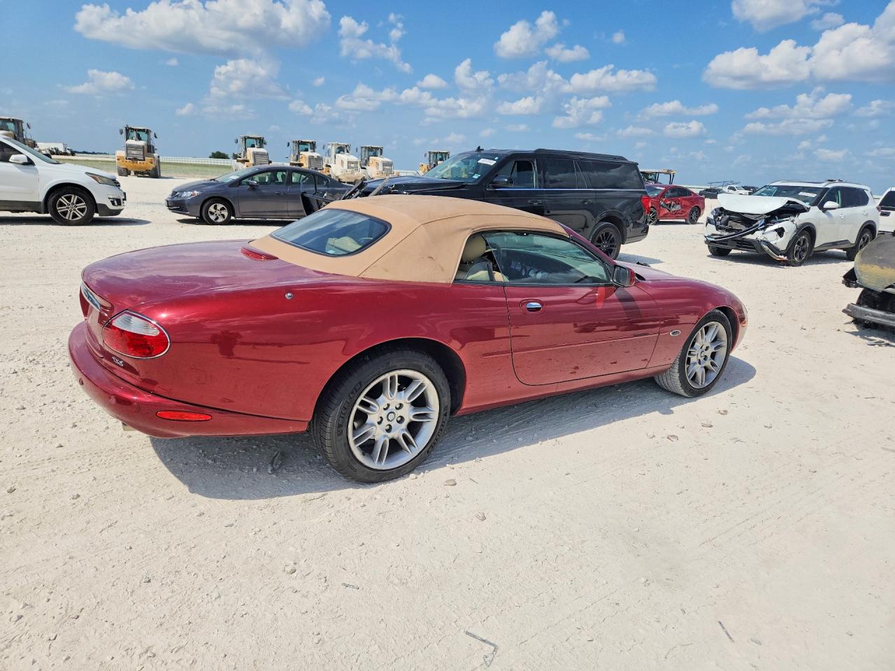 SAJDA42CX2NA24037 · 2002 JAGUAR XK8 · 3/12