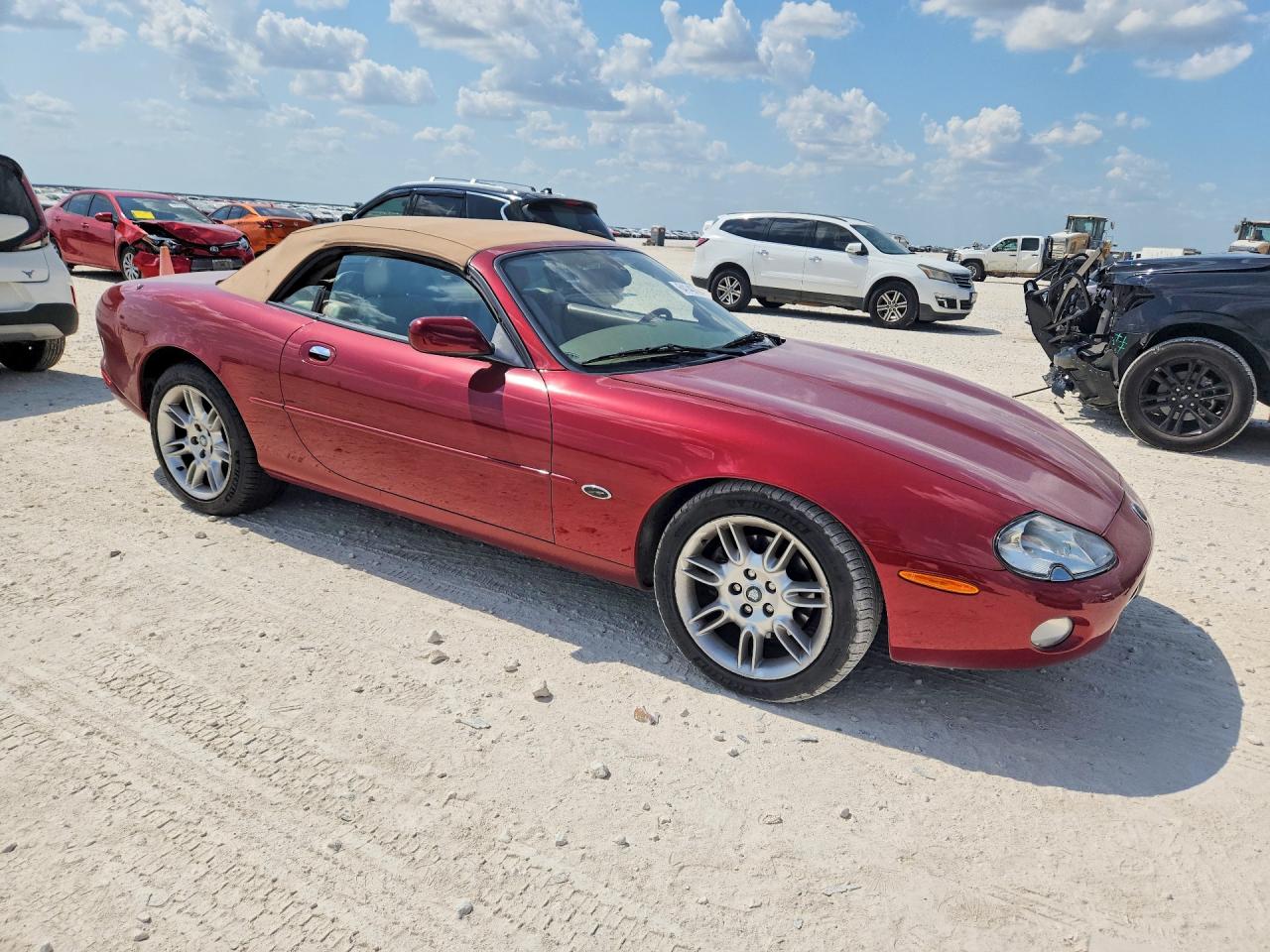 SAJDA42CX2NA24037 · 2002 JAGUAR XK8 · 4/12