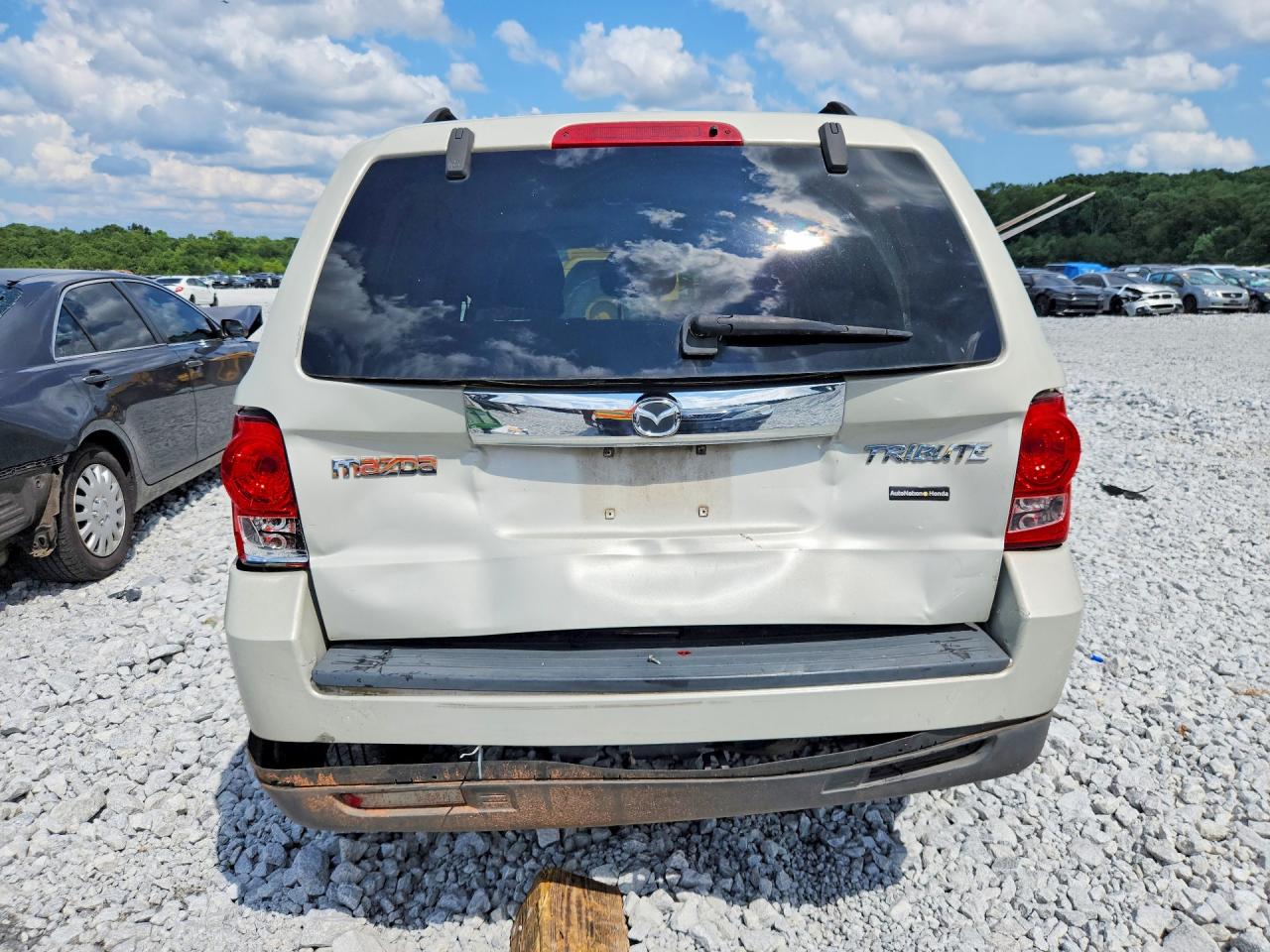 4F2CZ06158KM28696 · 2008 MAZDA TRIBUTE · 6/13