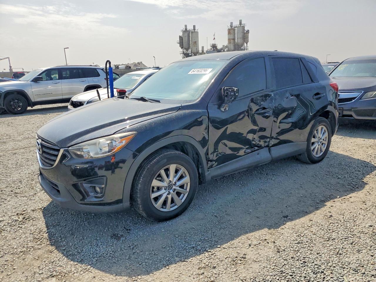 JM3KE2CY6G0801248 · 2016 MAZDA CX-5