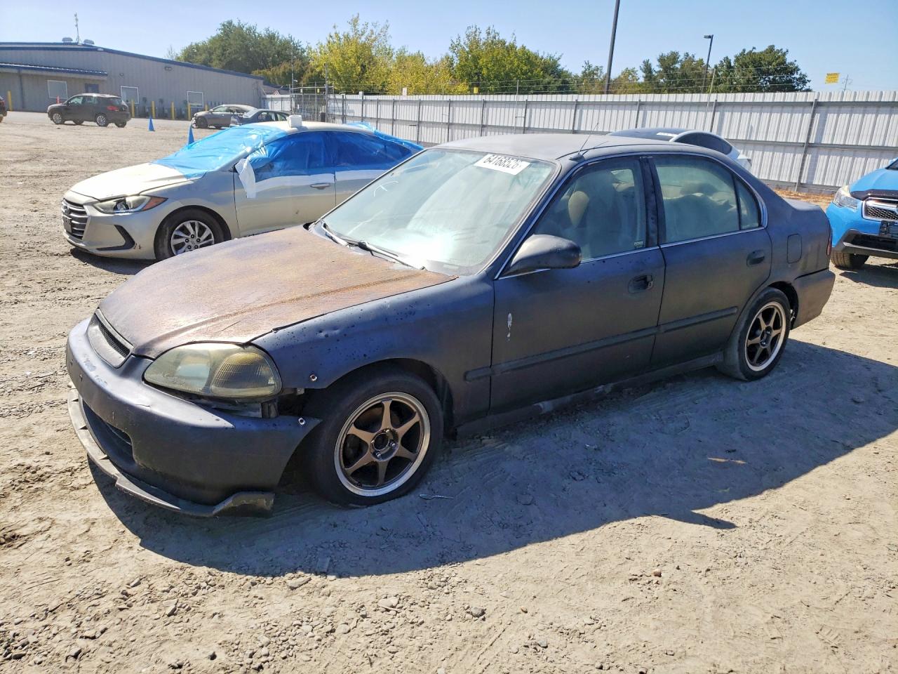 JHMEJ6678WS015061 · 1998 HONDA CIVIC