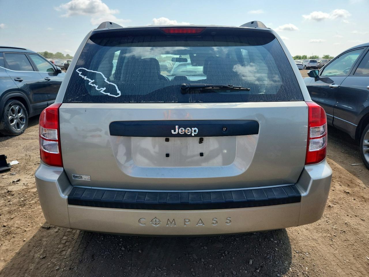 1J4FT47A69D173853 · 2009 JEEP COMPASS · 6/12