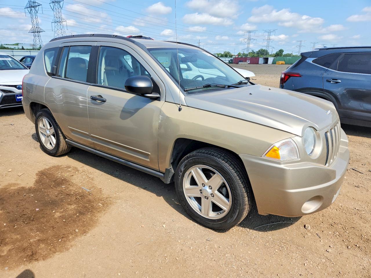 1J4FT47A69D173853 · 2009 JEEP COMPASS · 4/12