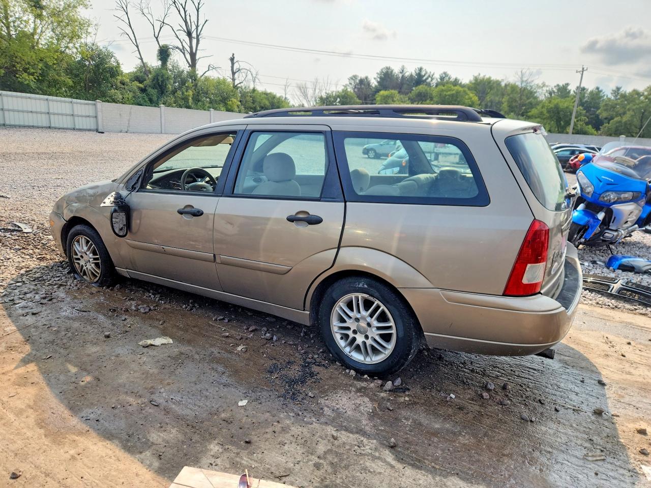 1FAHP36393W340000 · 2003 FORD FOCUS · 2/13