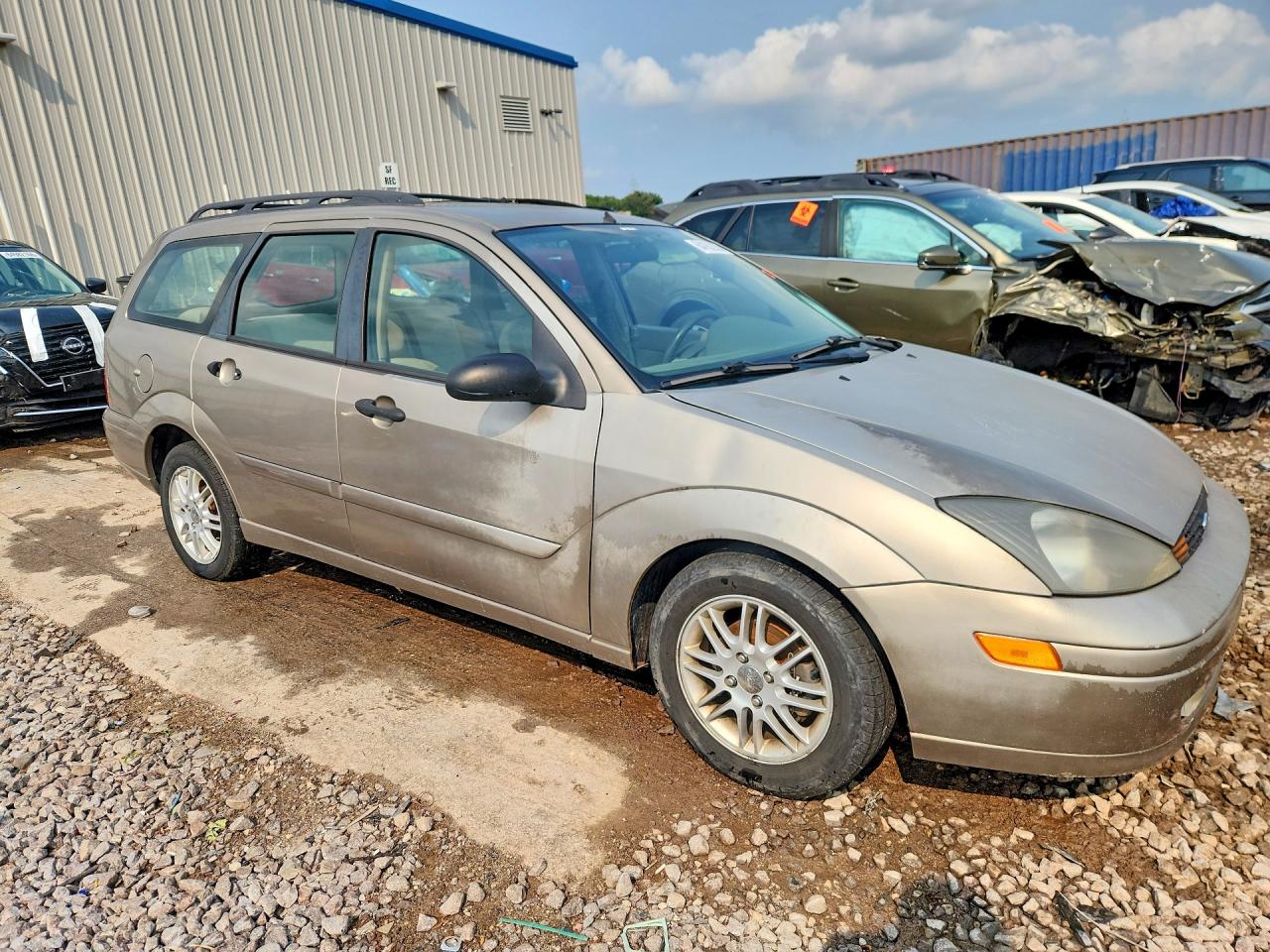 1FAHP36393W340000 · 2003 FORD FOCUS · 4/13