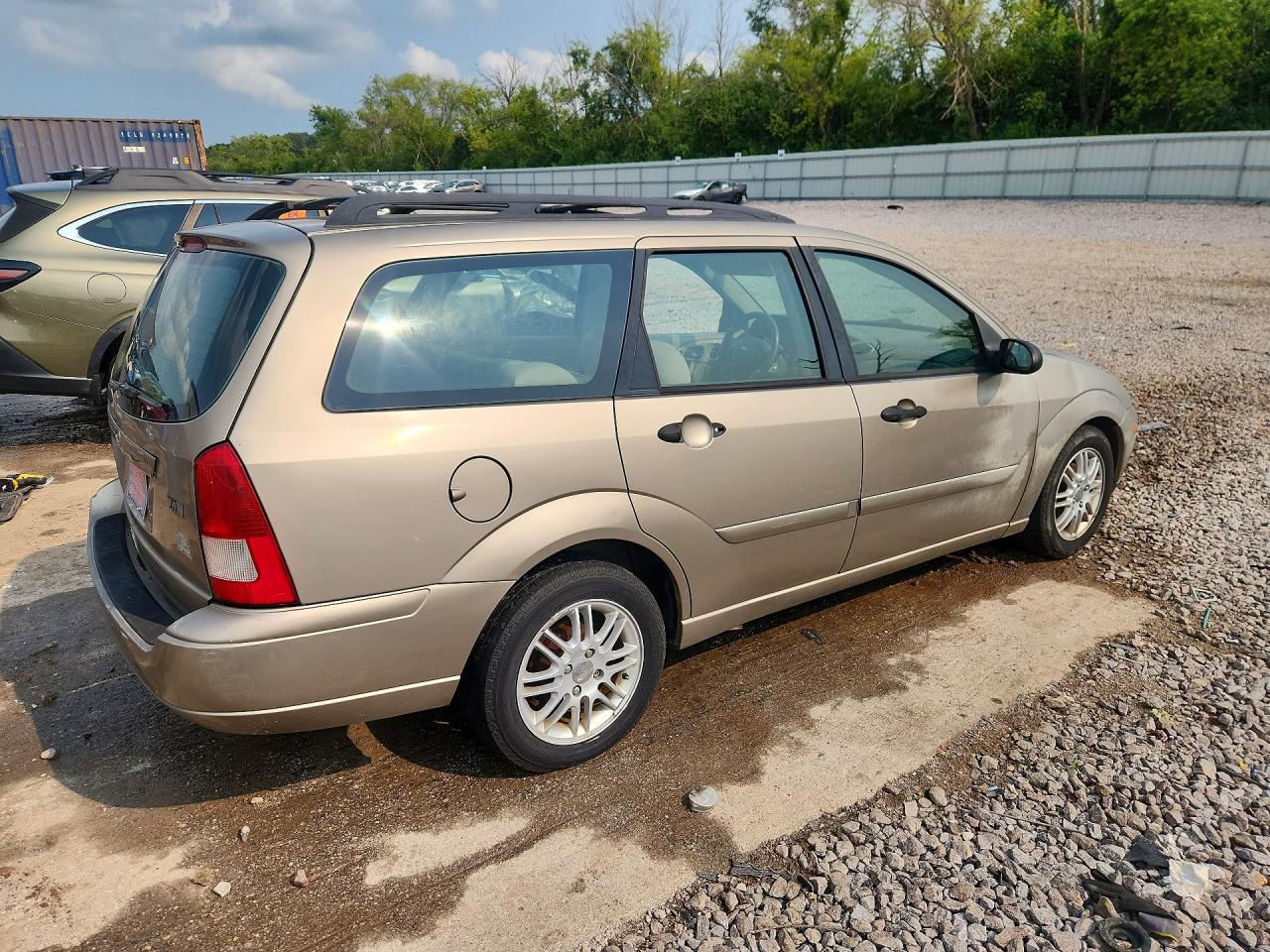 1FAHP36393W340000 · 2003 FORD FOCUS · 3/13