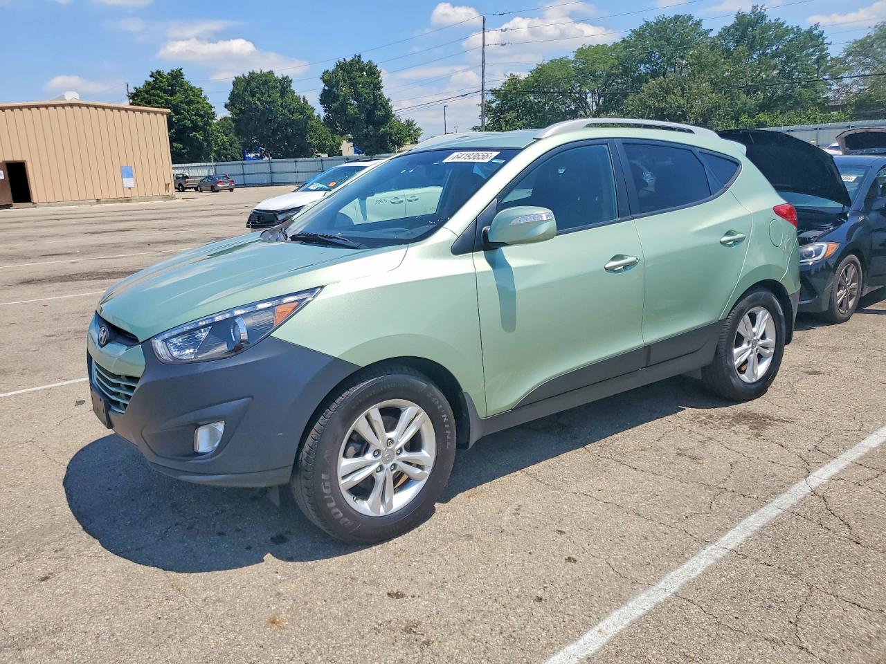 KM8JUCAC9DU685970 · 2013 HYUNDAI TUCSON