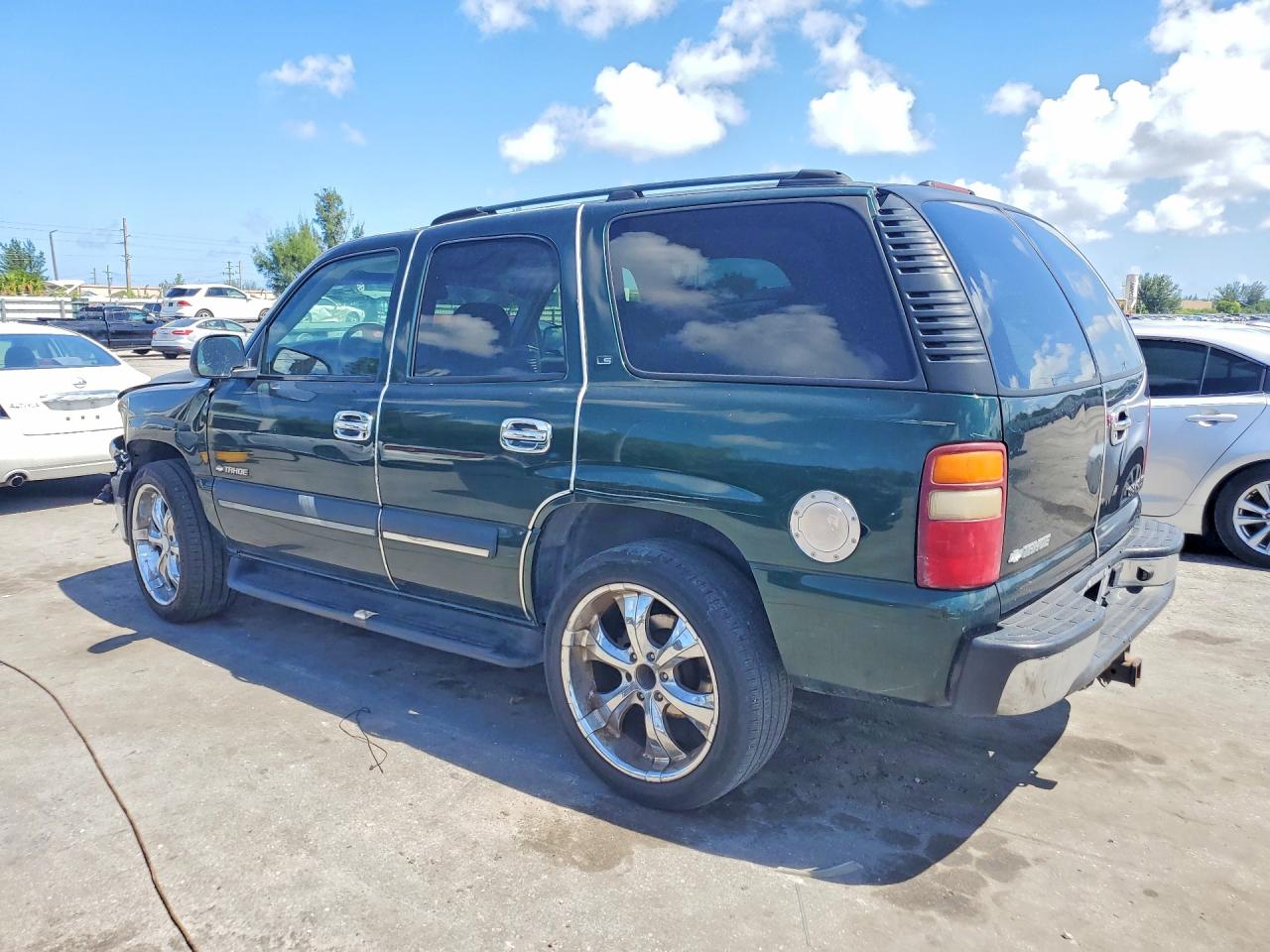 1GNEC13V63R125084 · 2003 CHEVROLET TAHOE · 2/12
