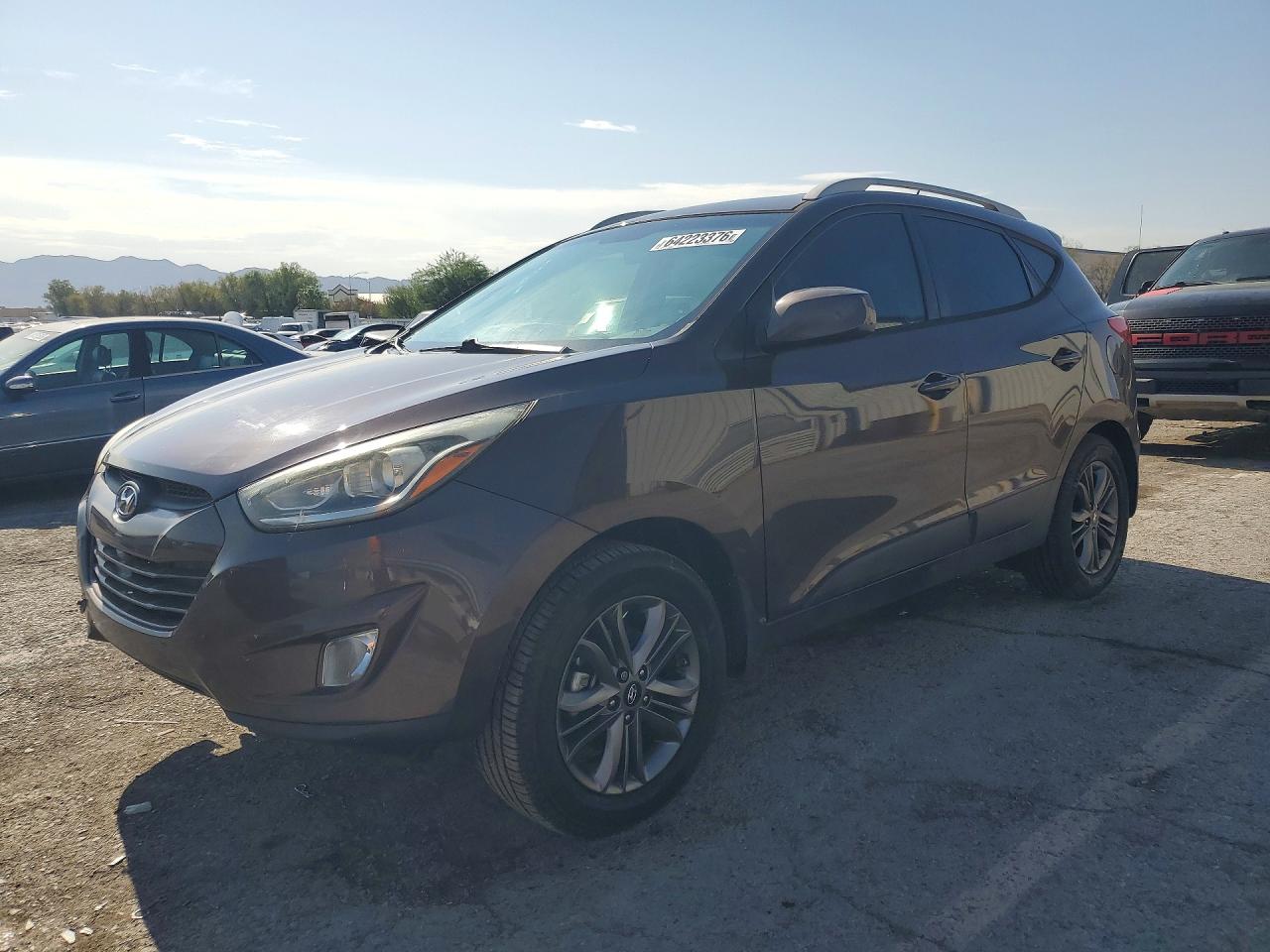KM8JU3AG1EU916249 · 2014 HYUNDAI TUCSON