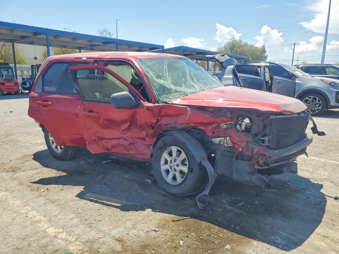 4F2CZ02769KM00076 · 2009 MAZDA TRIBUTE · 4/14
