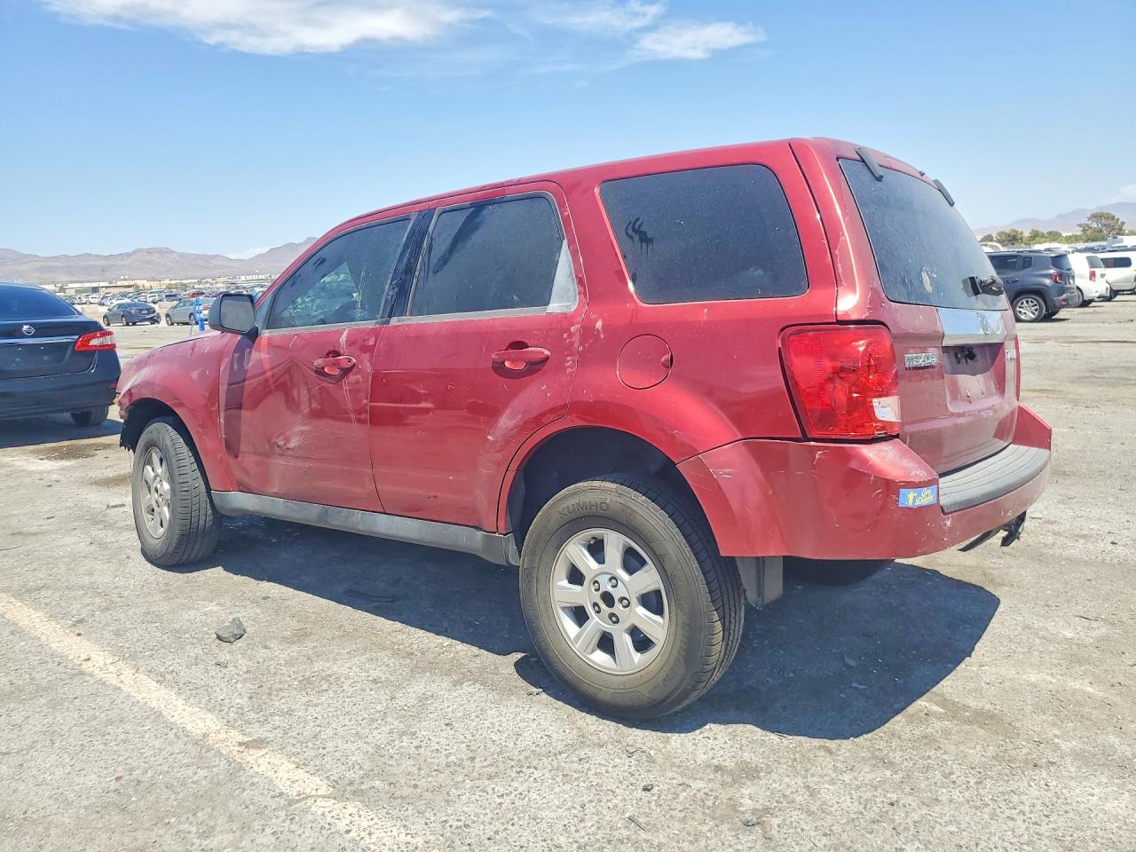4F2CZ02769KM00076 · 2009 MAZDA TRIBUTE · 2/14