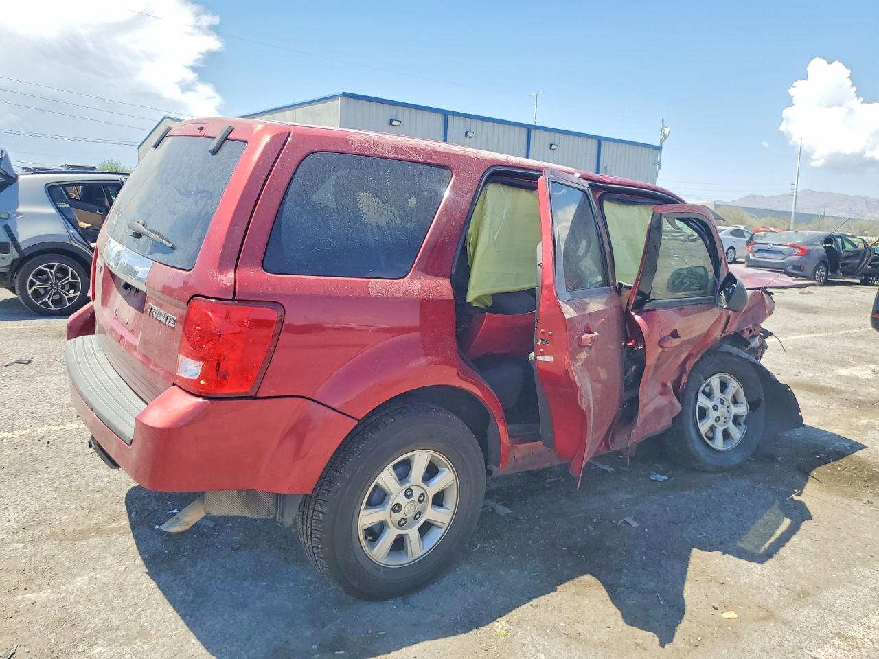 4F2CZ02769KM00076 · 2009 MAZDA TRIBUTE · 3/14