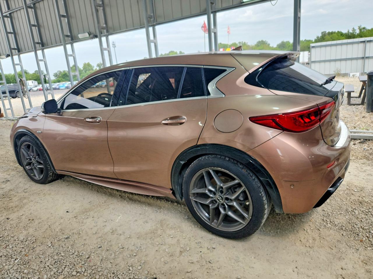 SJKCH5CP8HA032581 · 2017 INFINITI QX30 · 2/14