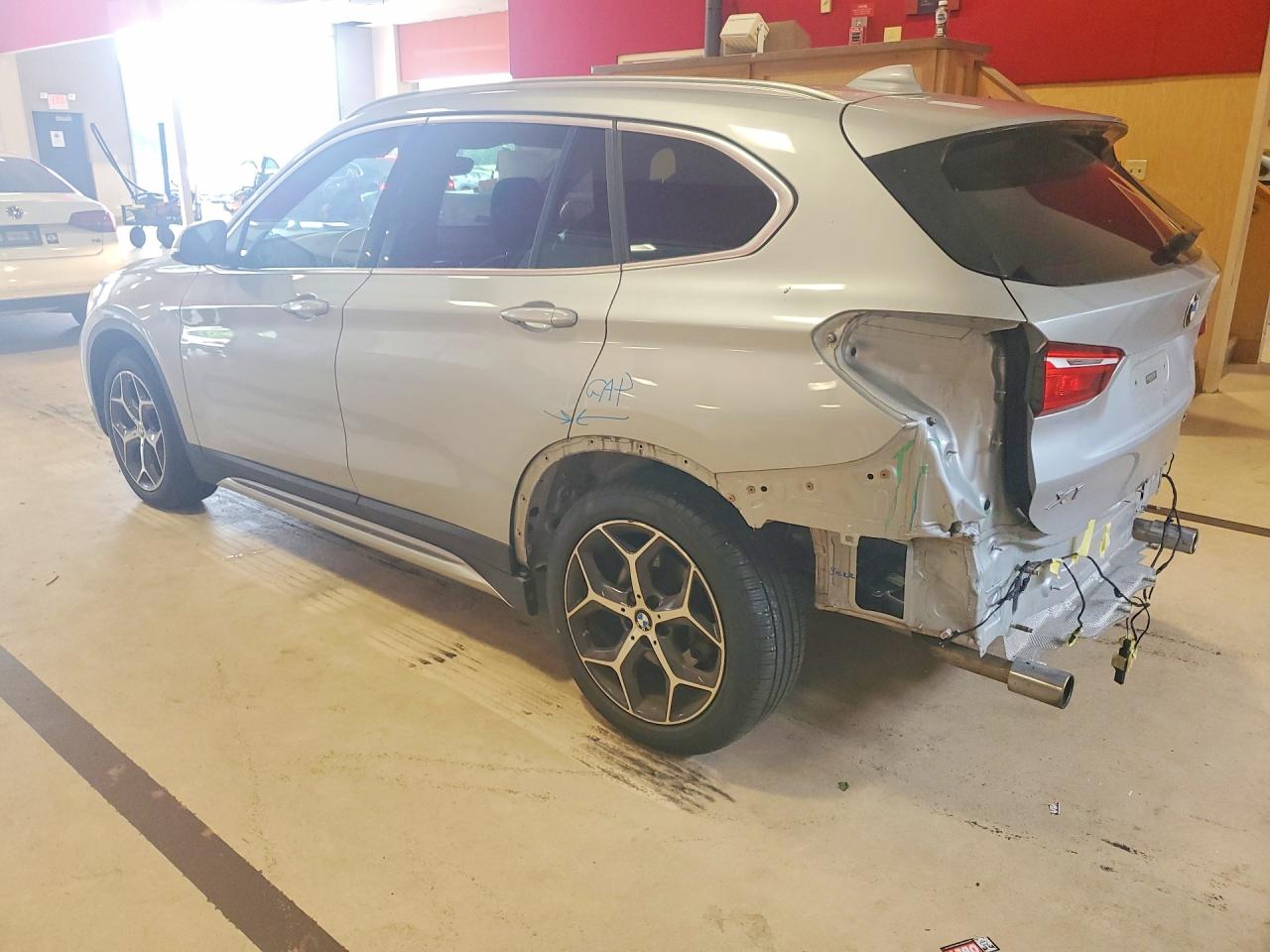 WBXHT3C35J5L28104 · 2018 BMW X1 · 2/13