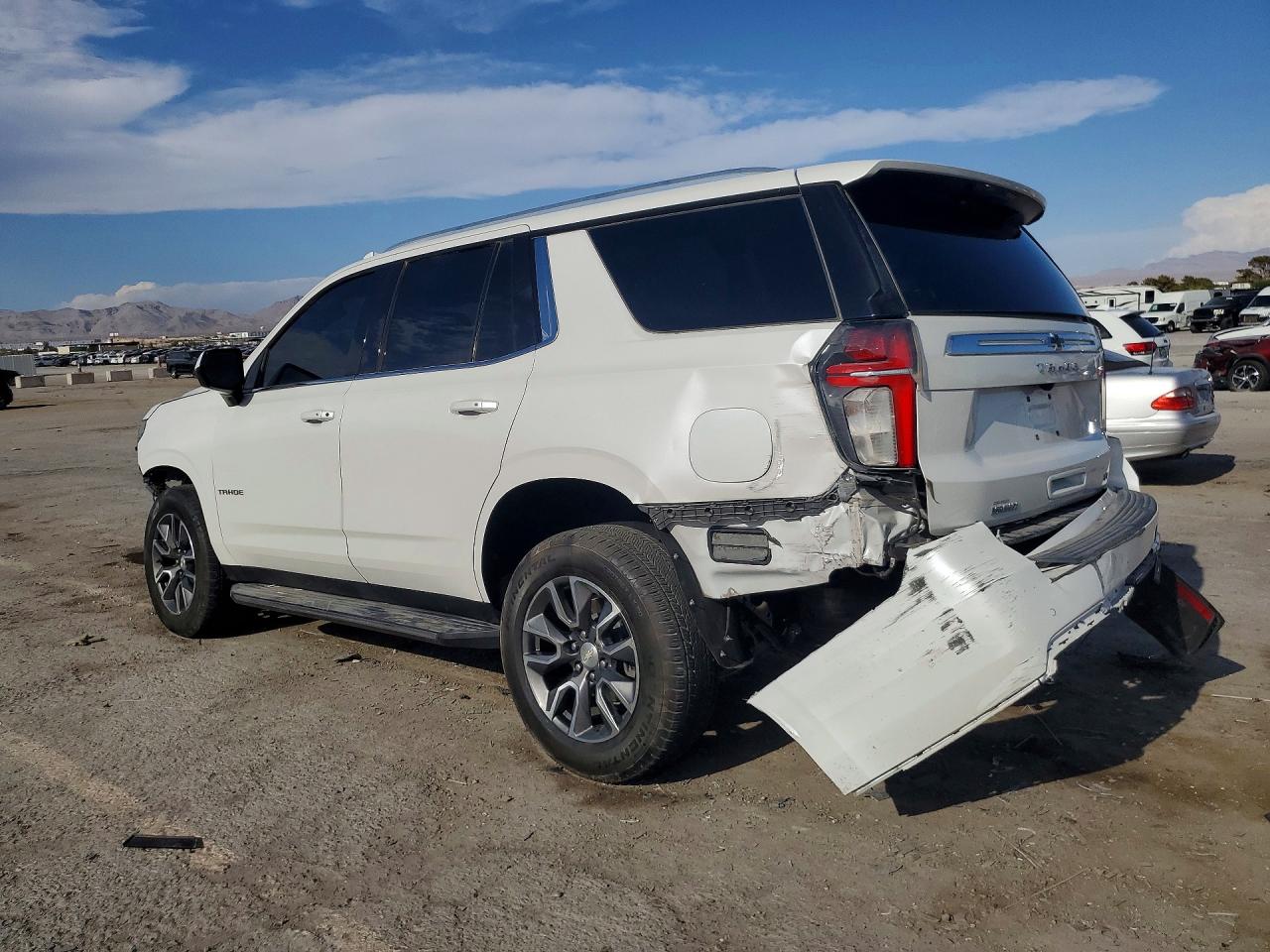 1GNSCNKTXMR395639 · 2021 CHEVROLET TAHOE · 2/14