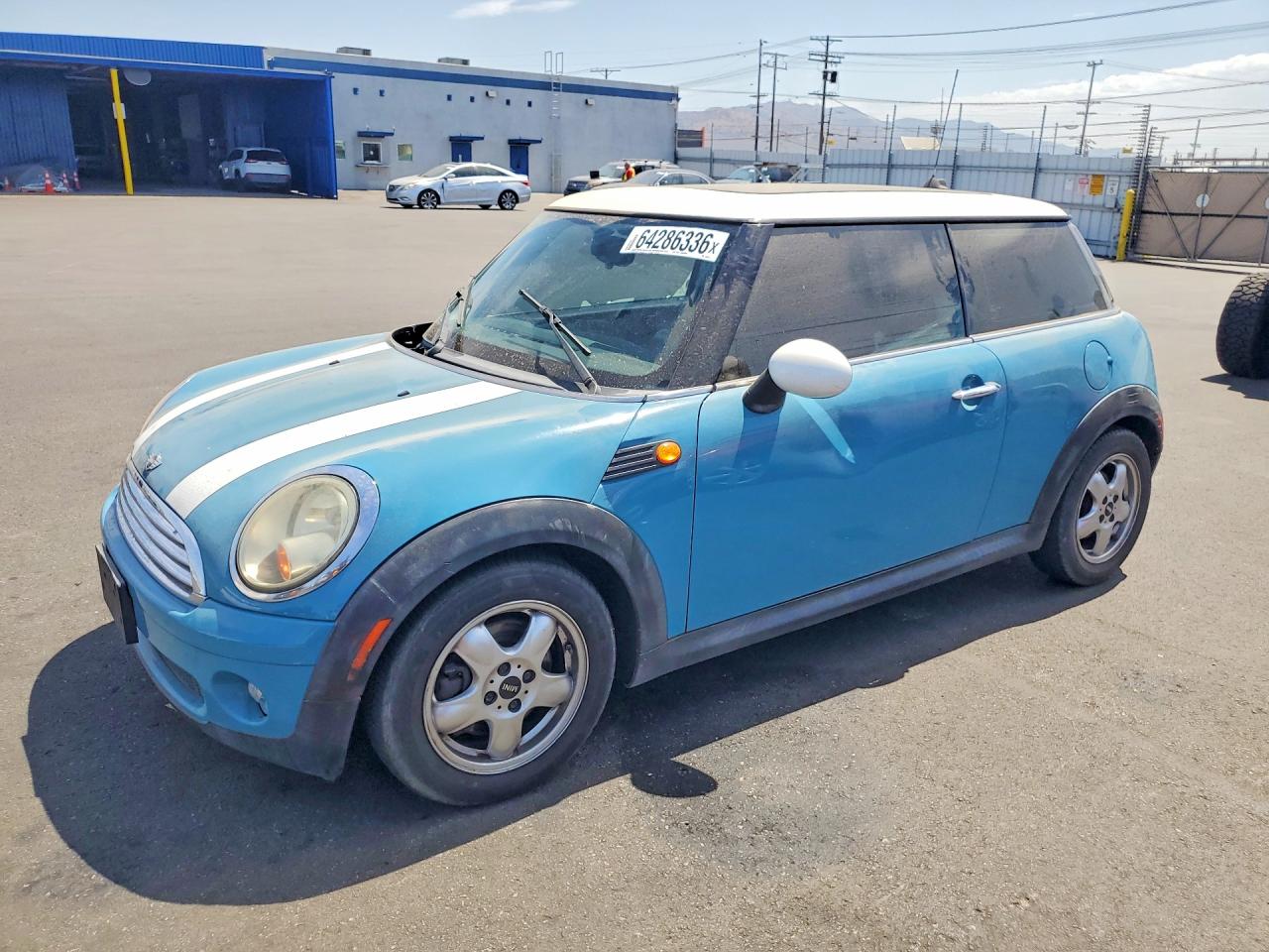 WMWMF33599TW76271 · 2009 MINI COOPER