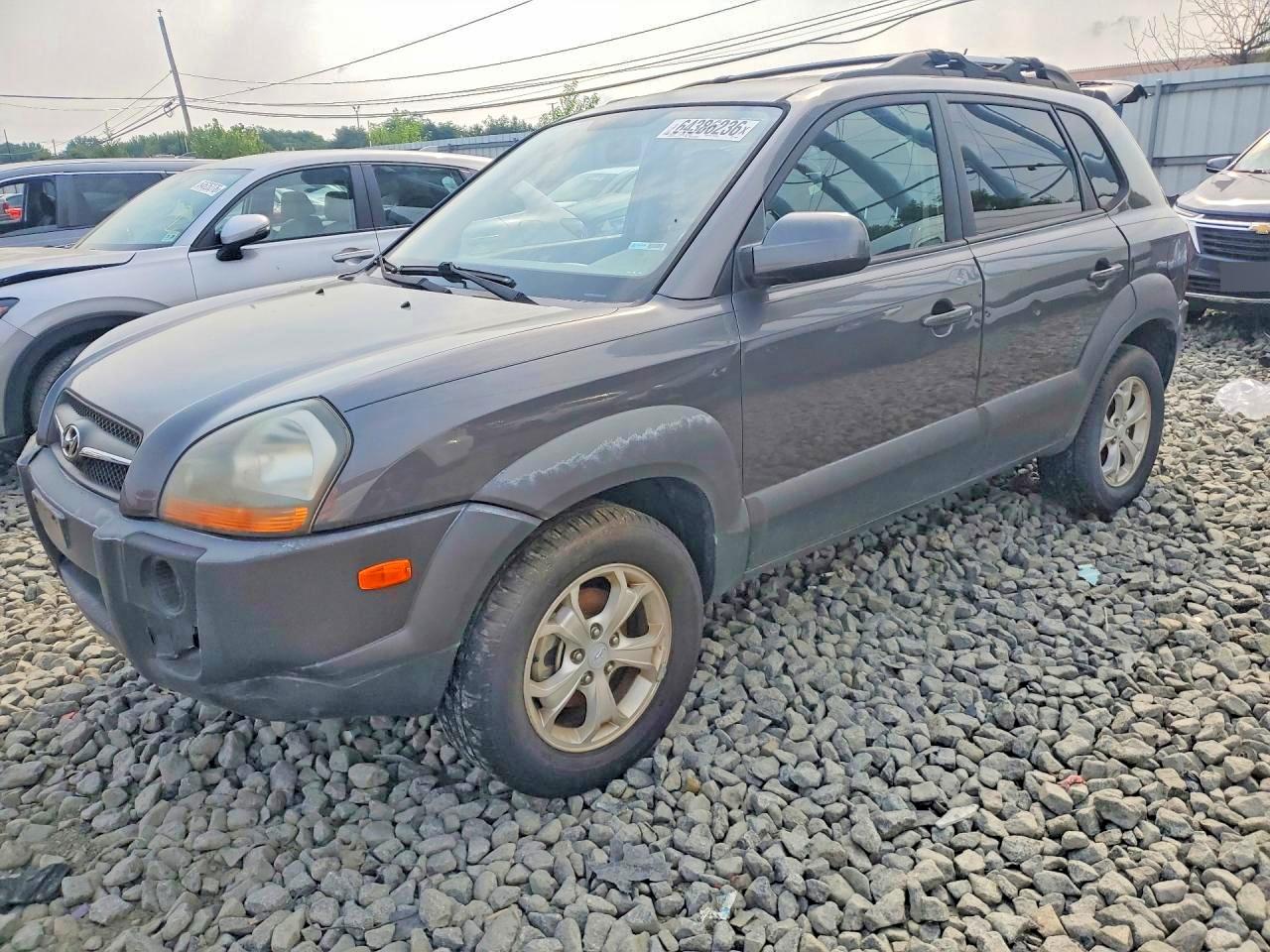 KM8JN72D09U943909 · 2009 HYUNDAI TUCSON
