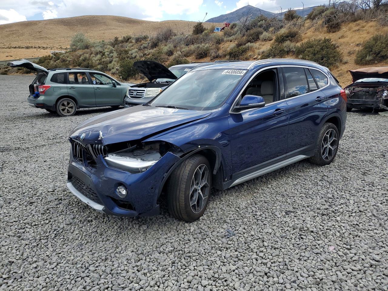 WBXHU7C30J3H43091 · 2018 BMW X1