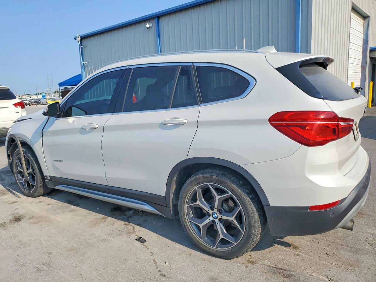 WBXHT3C31H5F80476 · 2017 BMW X1 · 2/14
