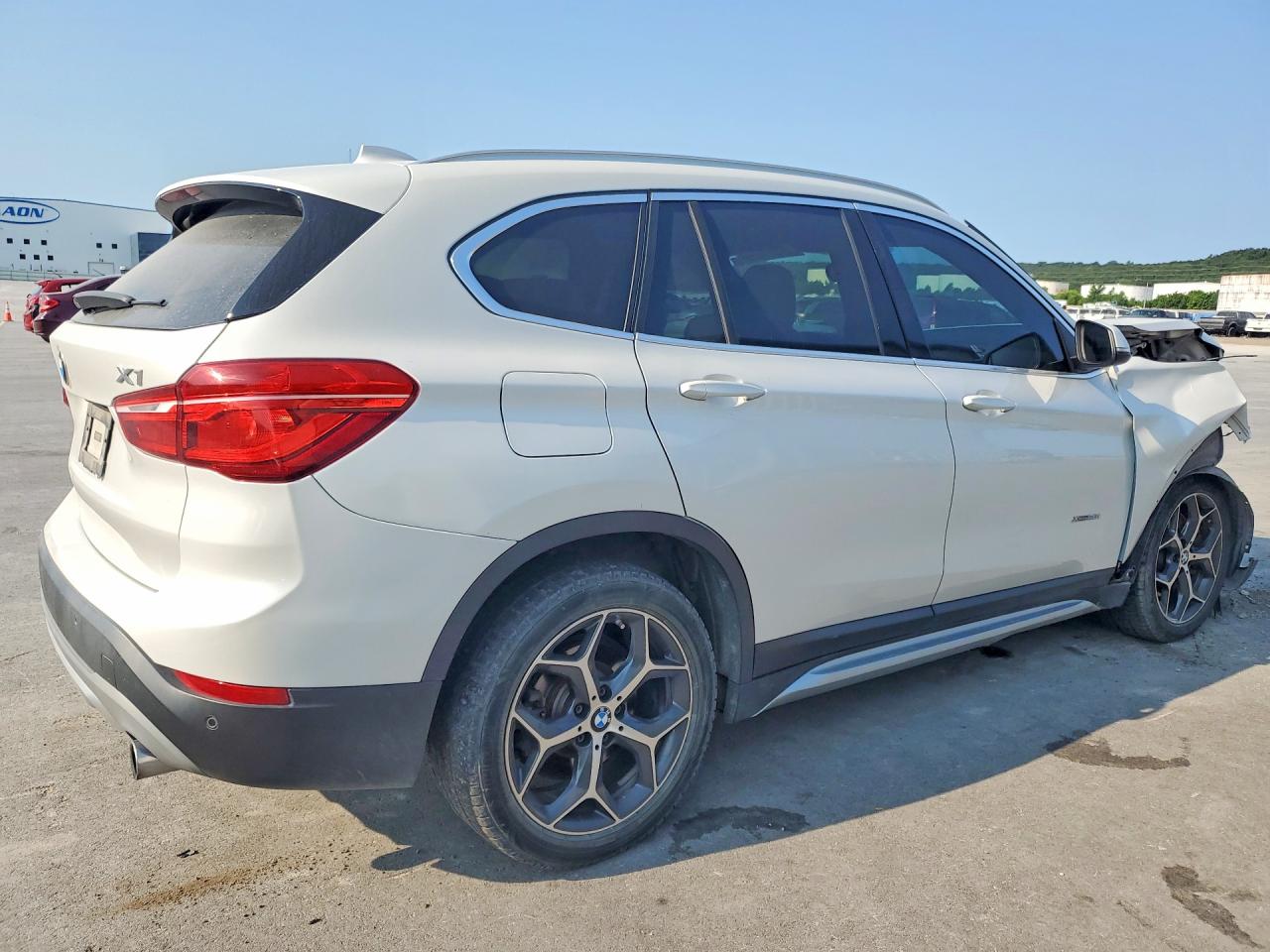 WBXHT3C31H5F80476 · 2017 BMW X1 · 3/14