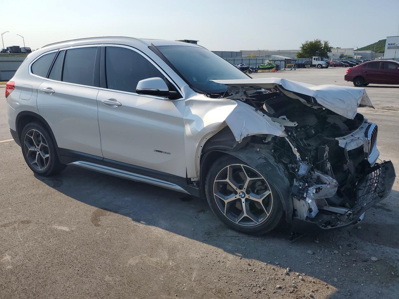 WBXHT3C31H5F80476 · 2017 BMW X1 · 4/14