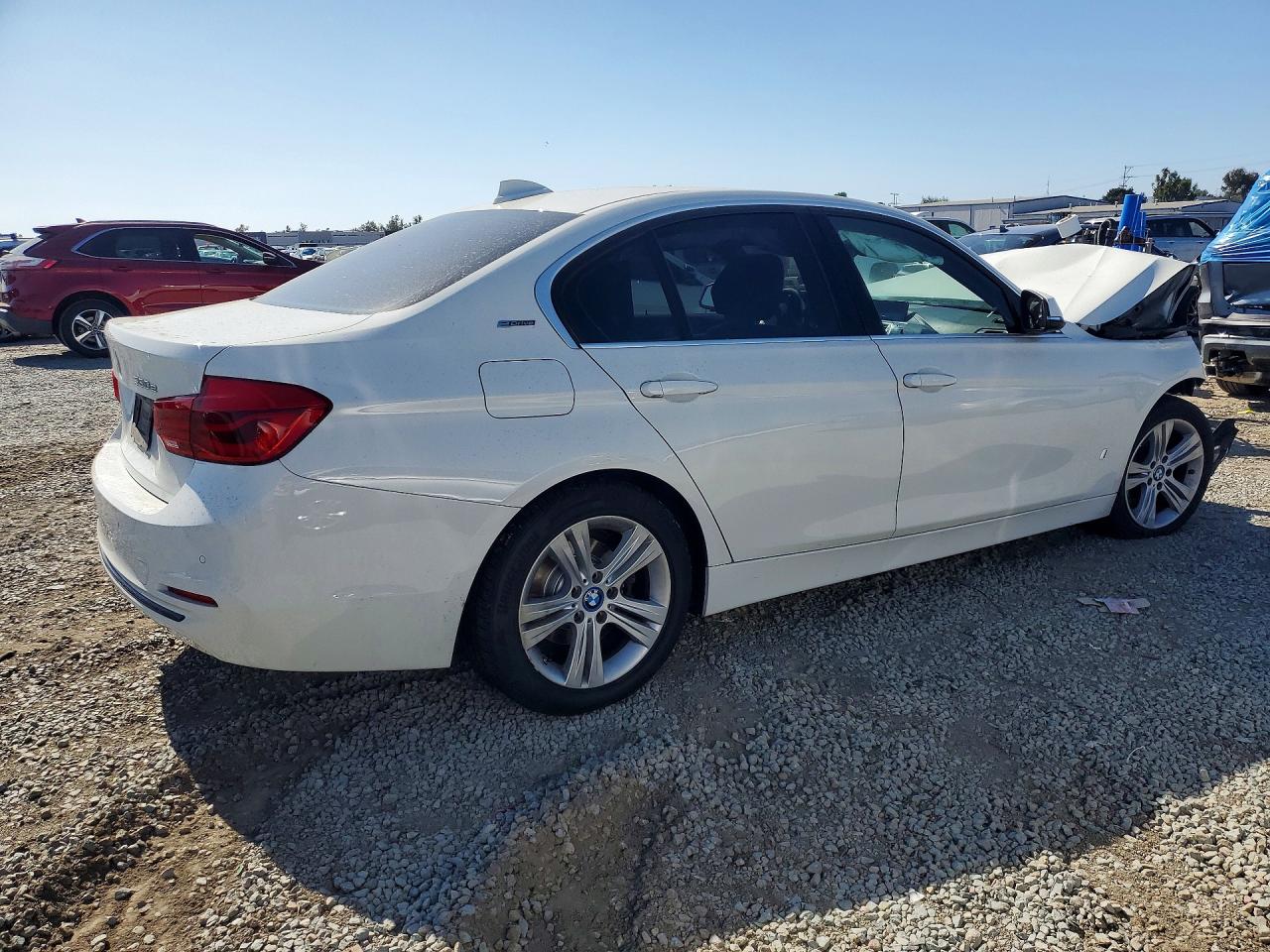WBA8E1C50JA178534 · 2018 BMW 330E · 3/13