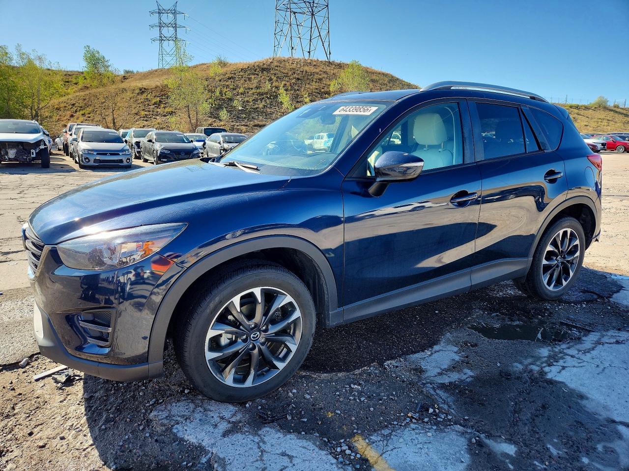 JM3KE4DY5G0603027 · 2016 MAZDA CX-5
