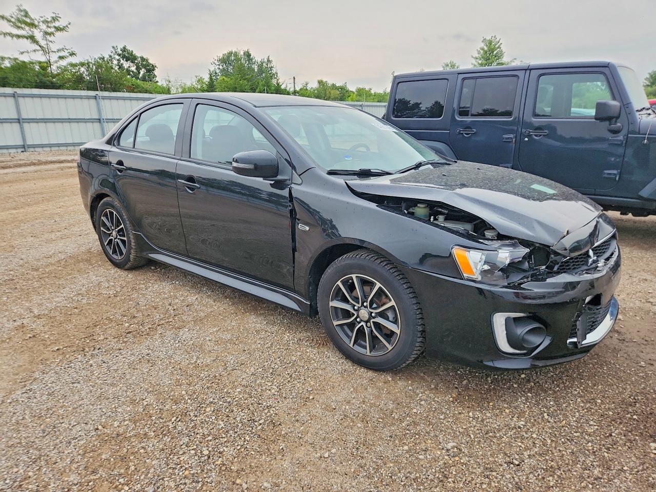 JA32V2FW8GU003716 · 2016 MITSUBISHI LANCER · 4/12