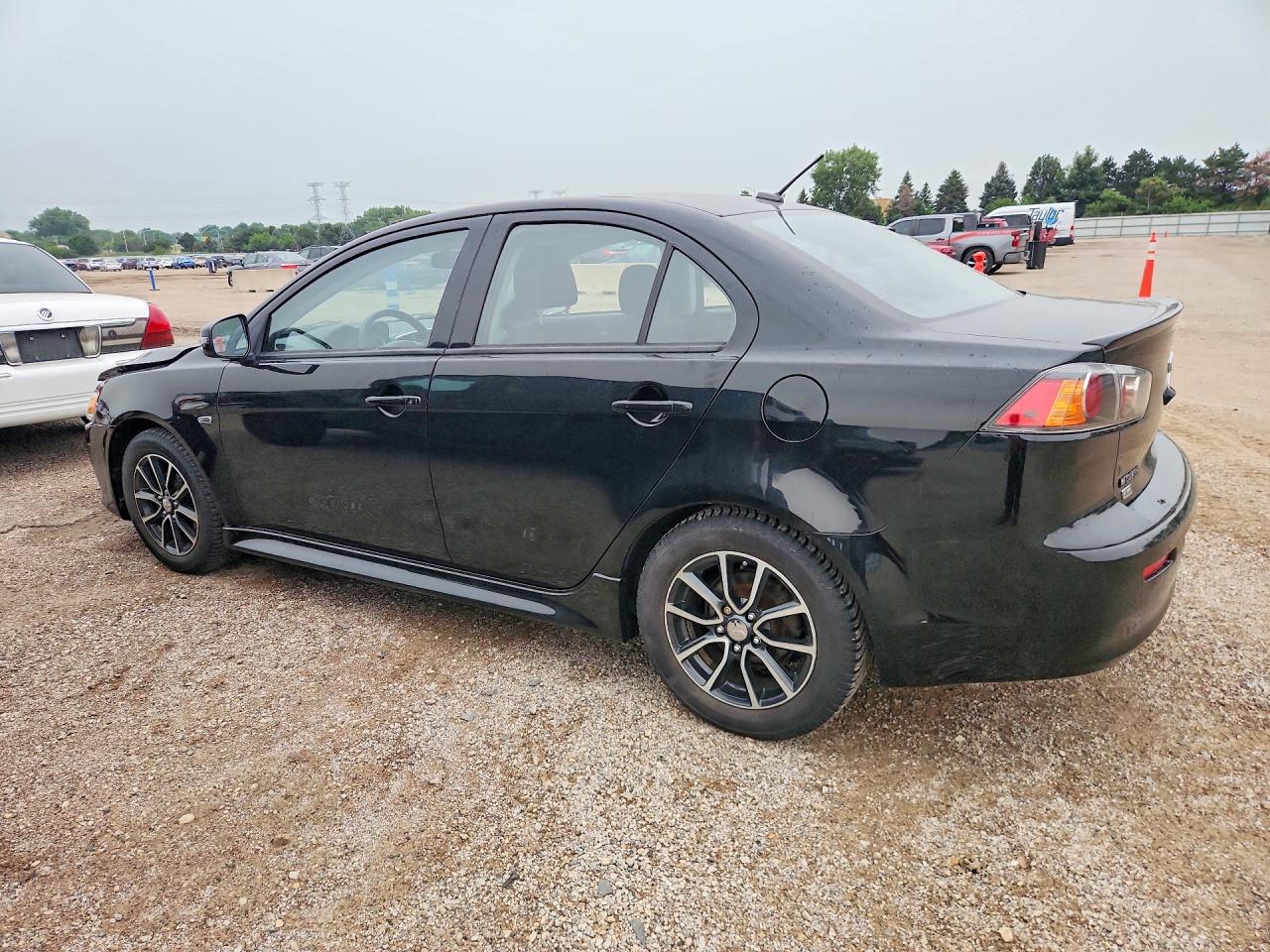 JA32V2FW8GU003716 · 2016 MITSUBISHI LANCER · 2/12