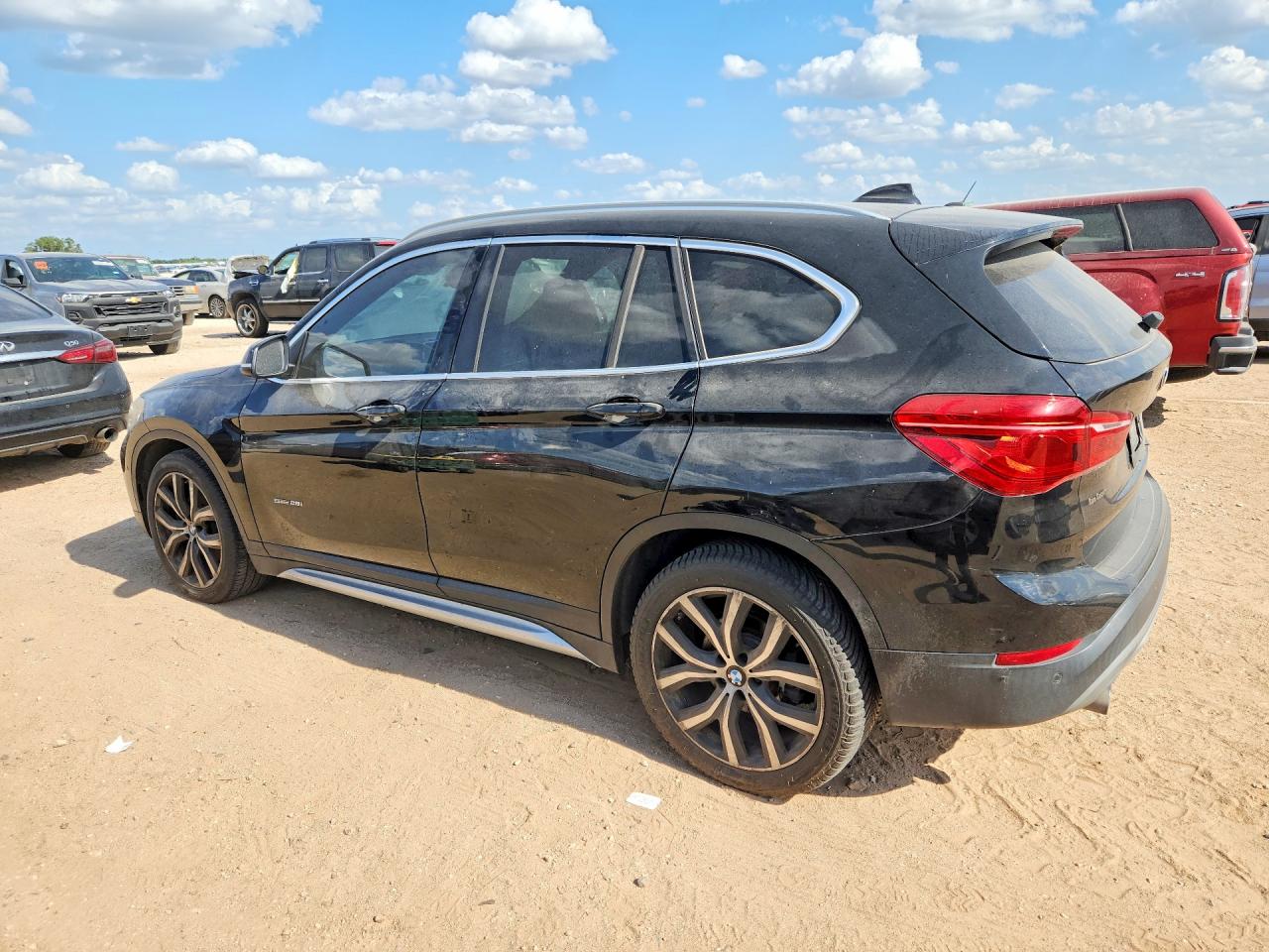 WBXHU7C35H5H34790 · 2017 BMW X1 · 2/14