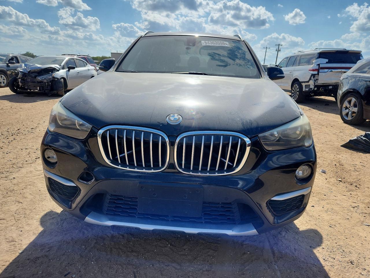 WBXHU7C35H5H34790 · 2017 BMW X1 · 5/14