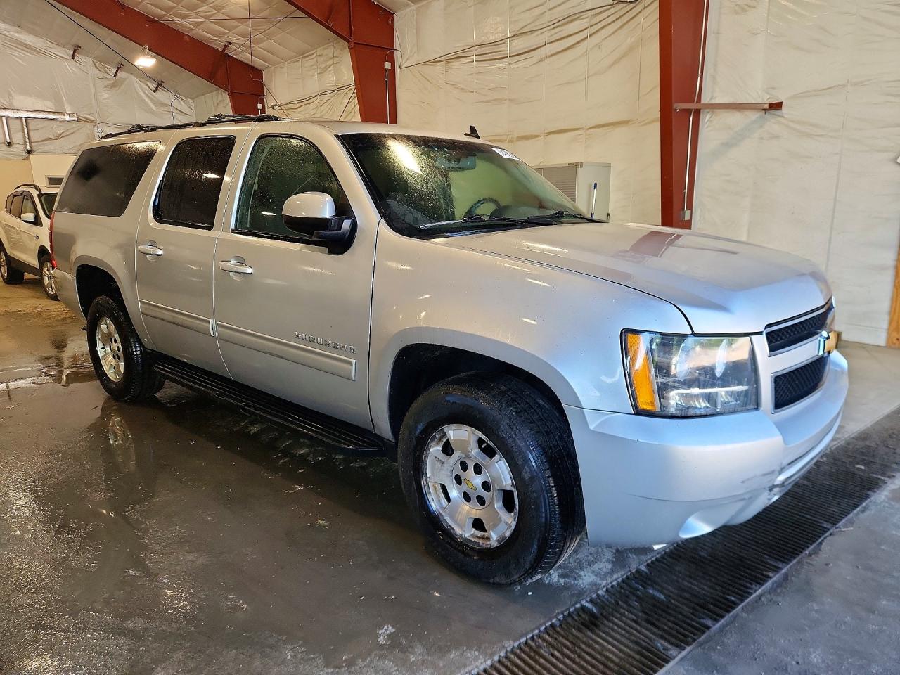 1GNSKHE70CR246724 · 2012 CHEVROLET SUBURBAN · 4/13