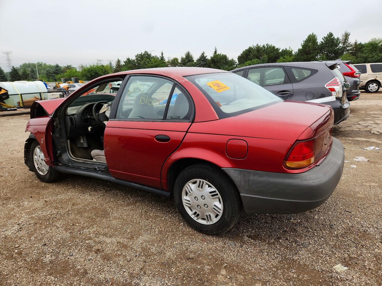 1G8ZH5284TZ320979 · 1996 SATURN SL1 · 2/12