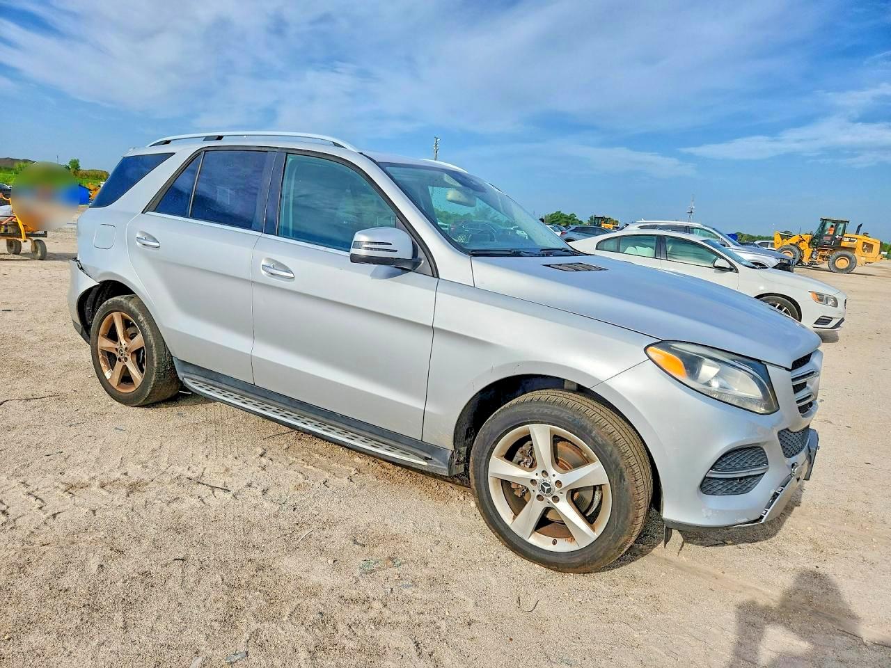 4JGDA5JB1GA696699 · 2016 MERCEDES-BENZ GLE · 4/14