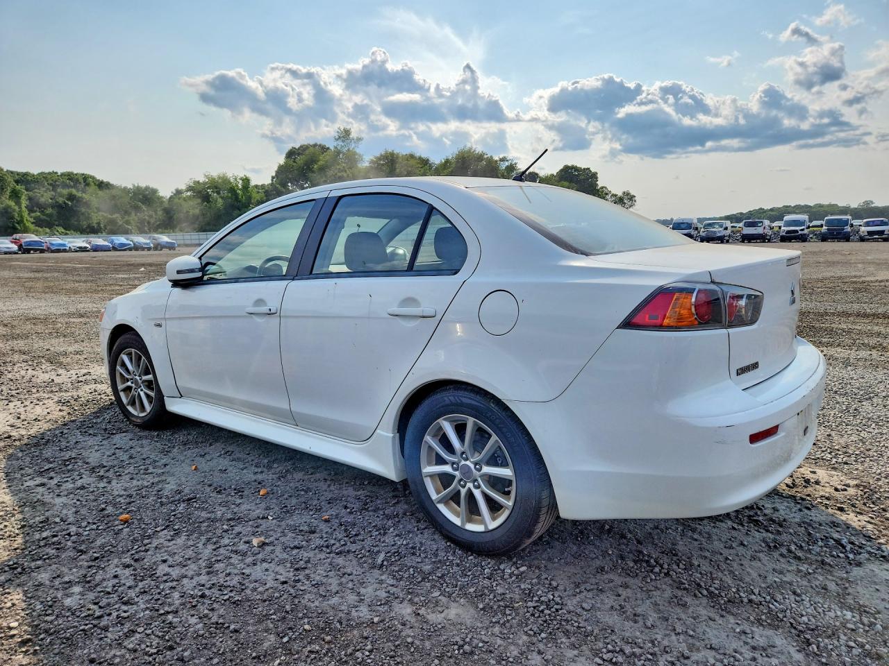 JA32U2FUXFU002311 · 2015 MITSUBISHI LANCER · 2/12
