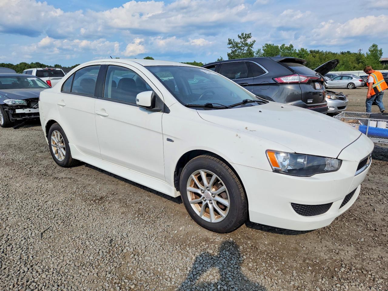 JA32U2FUXFU002311 · 2015 MITSUBISHI LANCER · 4/12