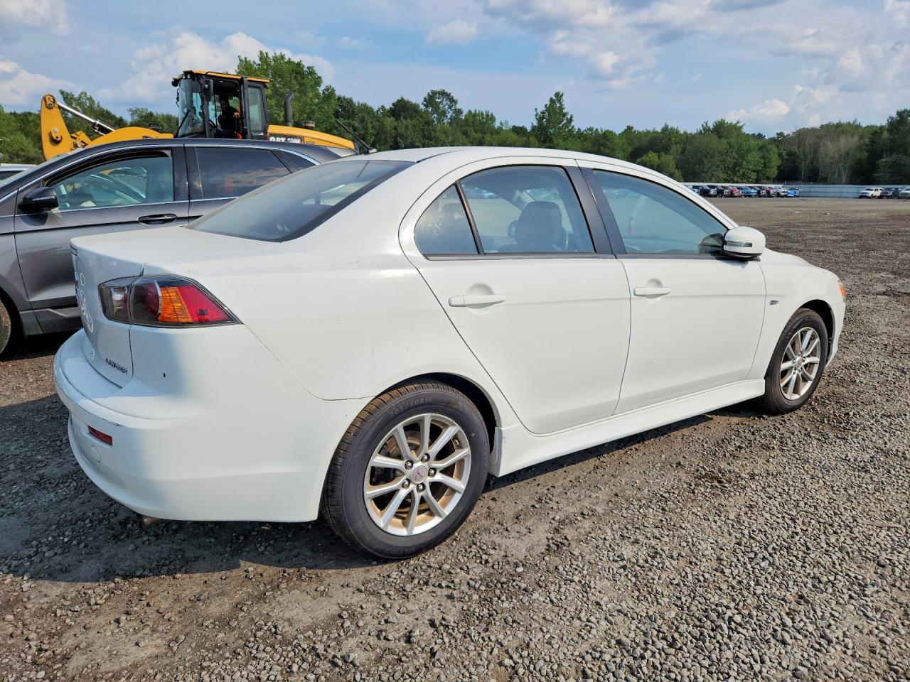 JA32U2FUXFU002311 · 2015 MITSUBISHI LANCER · 3/12