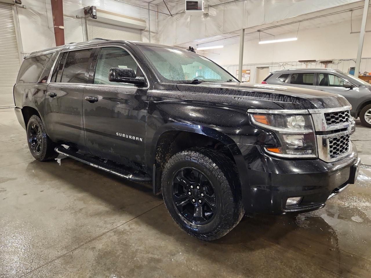 1GNSKHKC8KR215429 · 2019 CHEVROLET SUBURBAN · 4/13