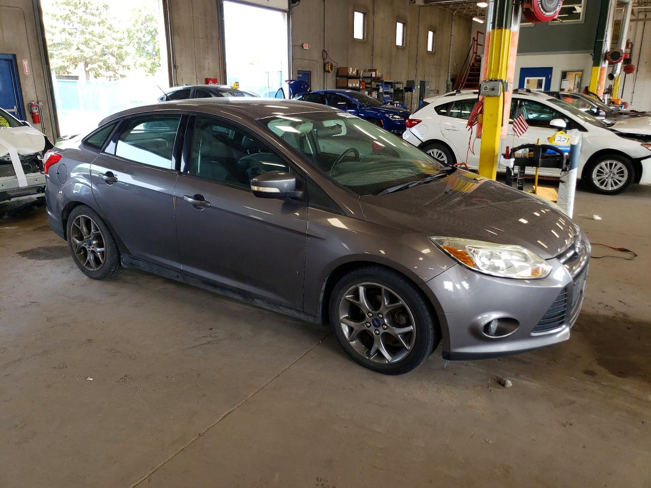 1FADP3F23EL209607 · 2014 FORD FOCUS · 4/13