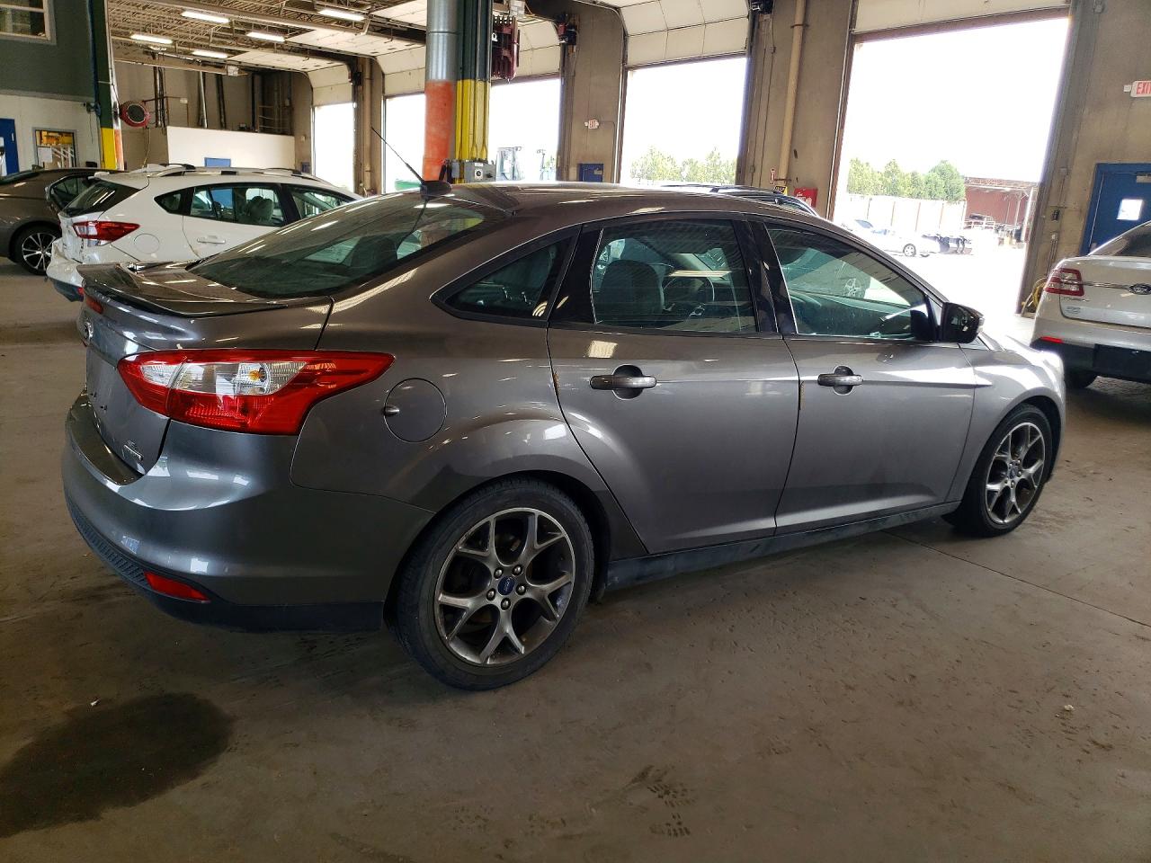 1FADP3F23EL209607 · 2014 FORD FOCUS · 3/13
