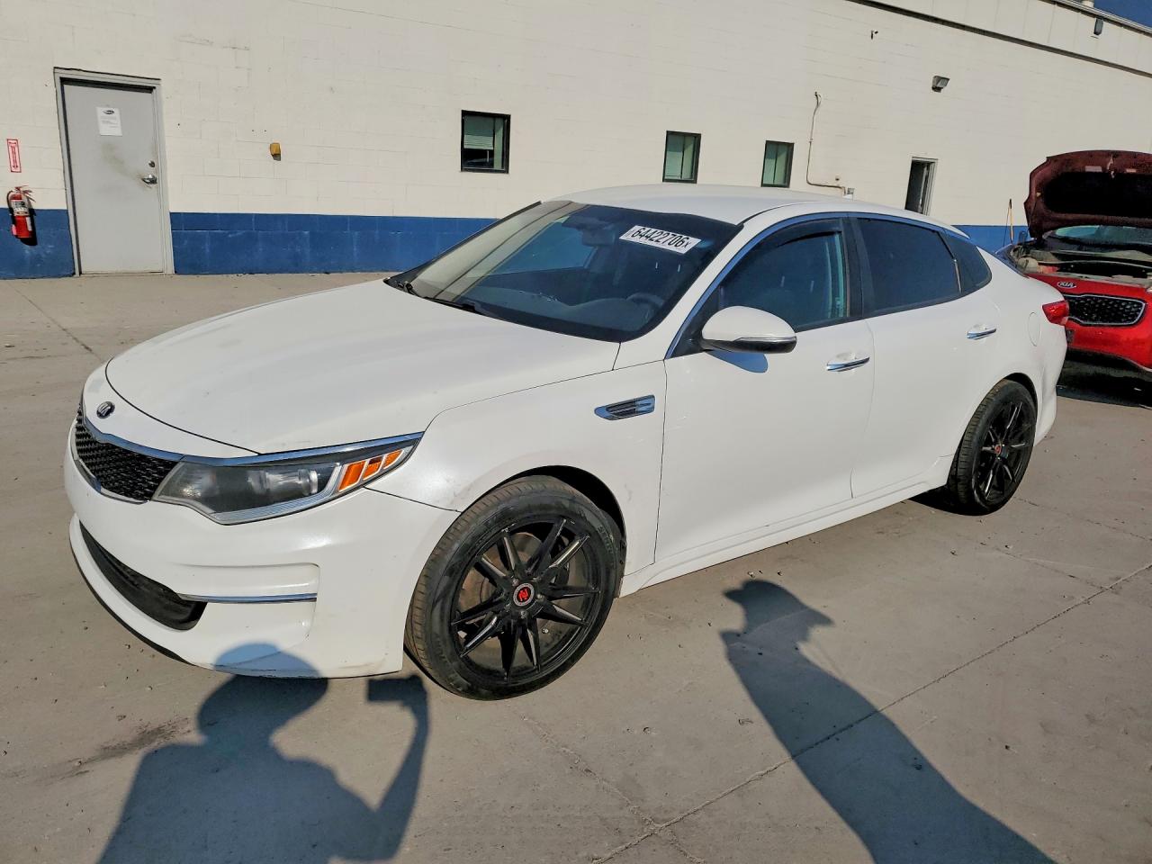 5XXGT4L31GG059652 · 2016 KIA OPTIMA