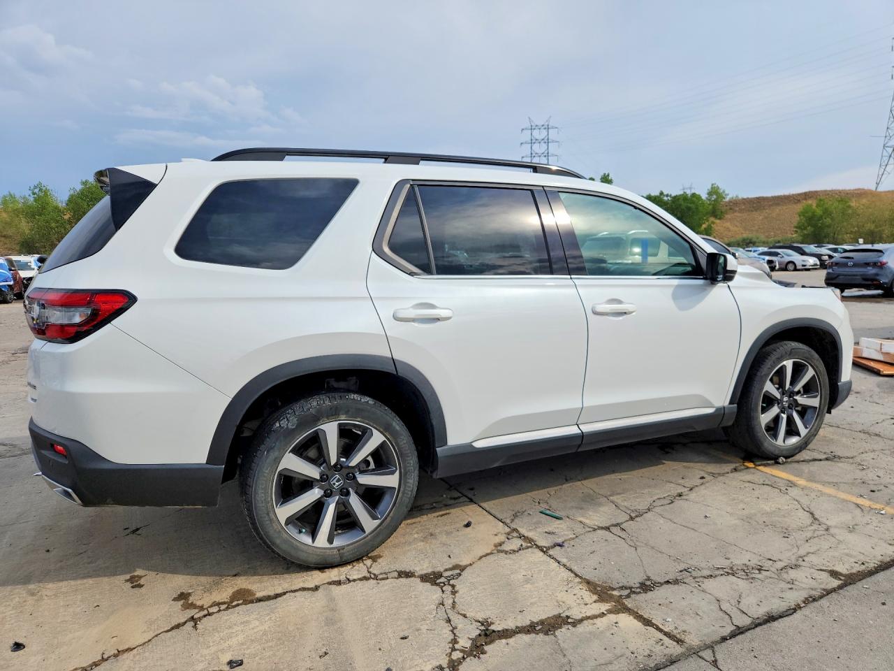5FNYG1H81PB001510 · 2023 HONDA PILOT · 3/14