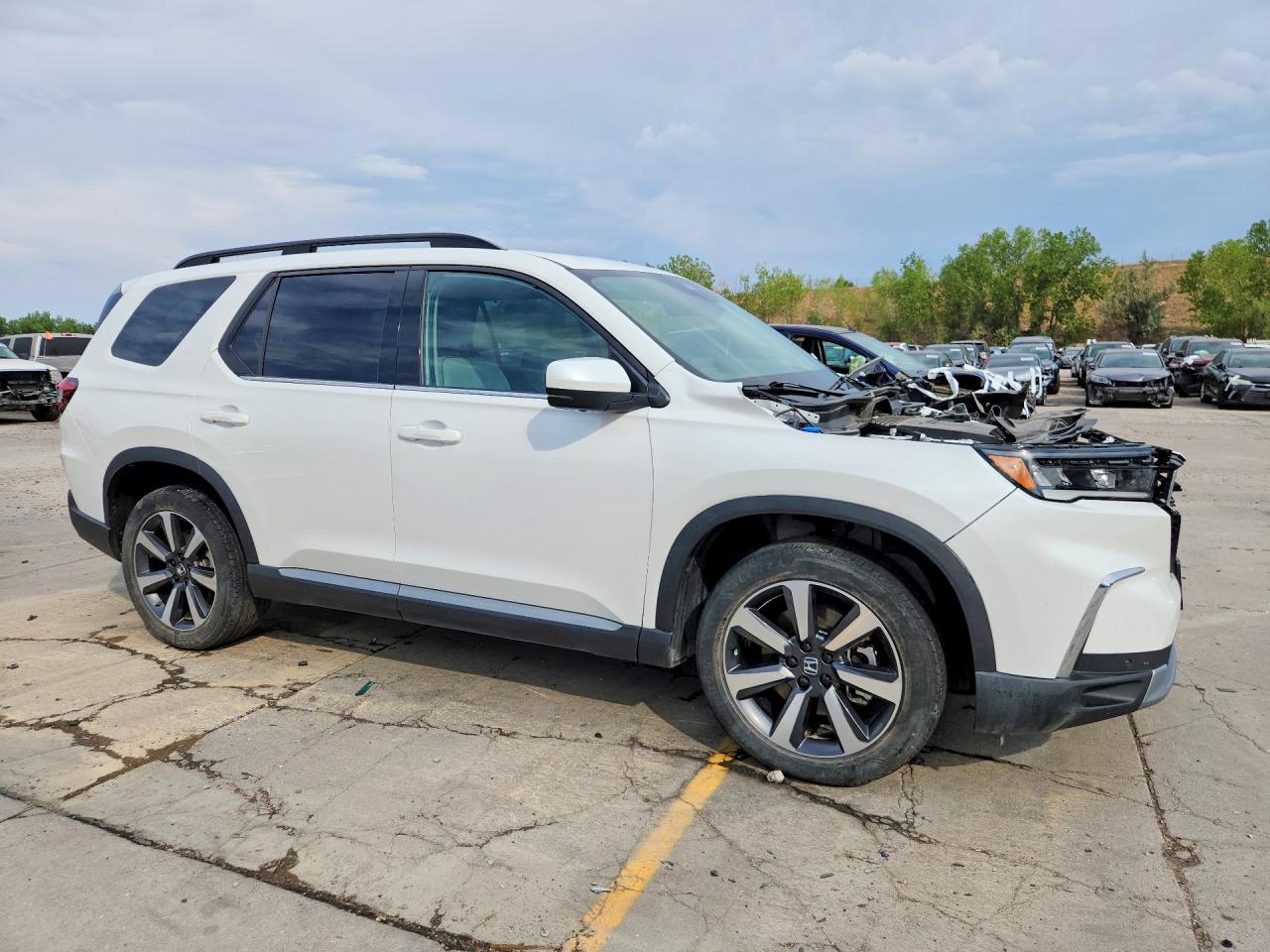 5FNYG1H81PB001510 · 2023 HONDA PILOT · 4/14
