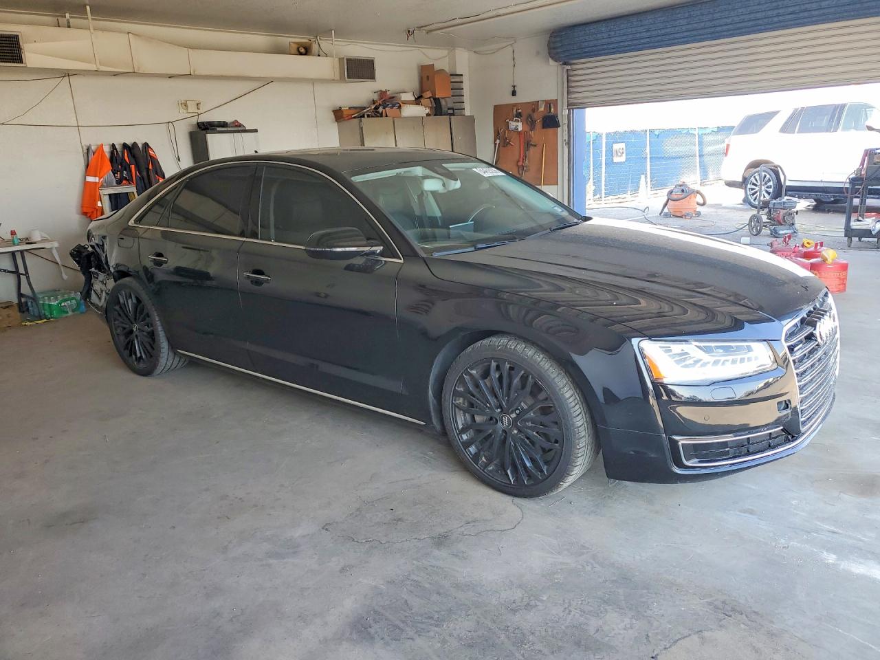 WAUJGAFD6FN008788 · 2015 AUDI A8 · 4/12