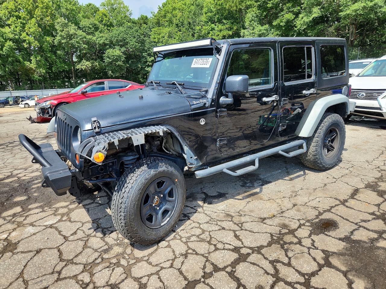 1J4BA6H12BL567831 · 2011 JEEP WRANGLER UNLIMITED