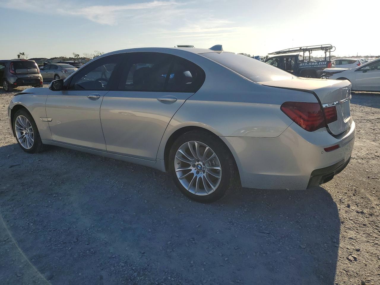 WBAYA6C52DD143876 · 2013 BMW 740 · 2/12