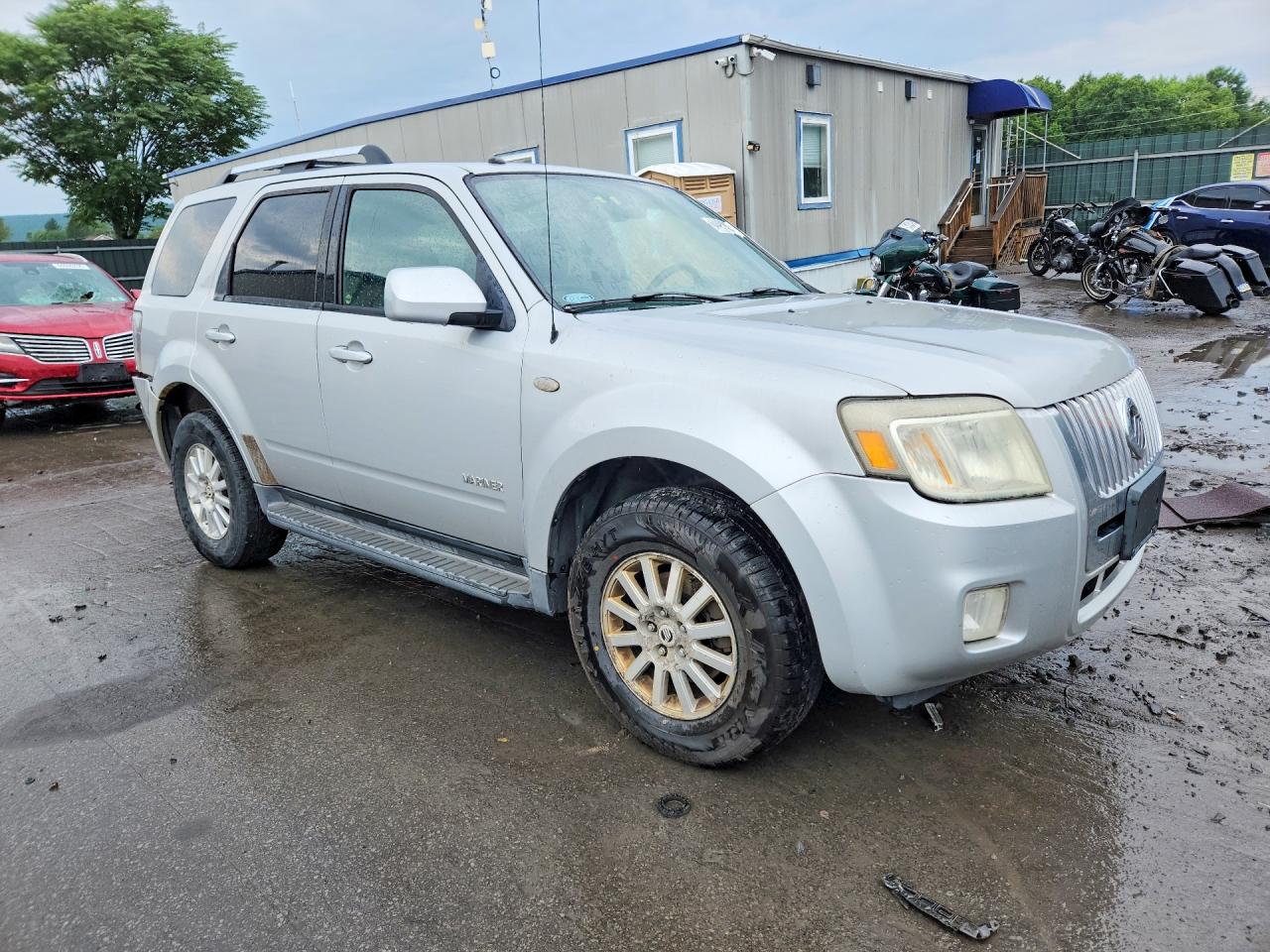 4M2CU971X8KJ10469 · 2008 MERCURY MARINER · 4/13